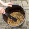 Mashlöffel, Futterrührer